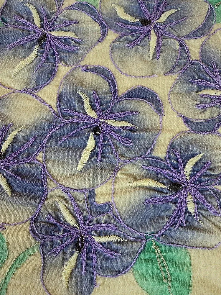 Vintage patchwork duvet full with embroidery purple flowers on beige Gingham
